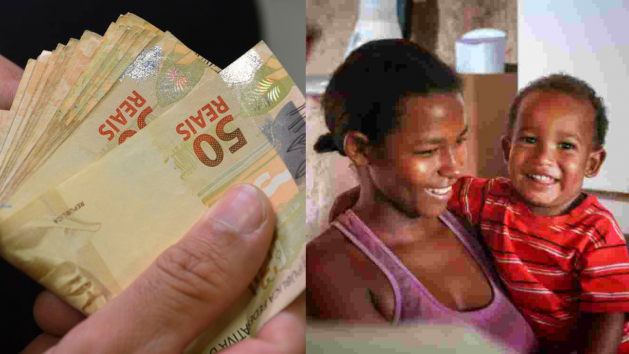 Mãe solo sorrindo enquanto segura seu filho pequeno no colo.